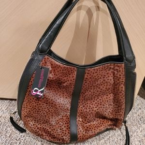 Sondra Roberts new leather calf skin exterior